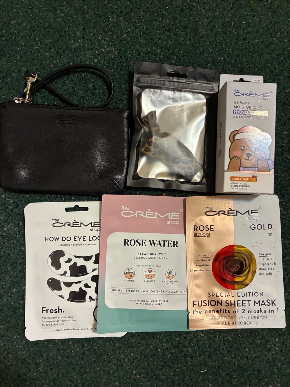 6pc Coach Black Leather Wristlet Pouch with Skincare Sheet Mask Bundle